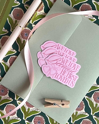 We Love Because He First Loved Us Sticker